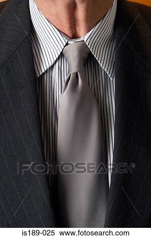 Stock Photography - Close up of businessman wearing a shirt and tie. Fotosearch