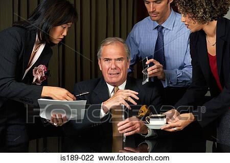 Stock Image - Overworked businessman. Fotosearch
