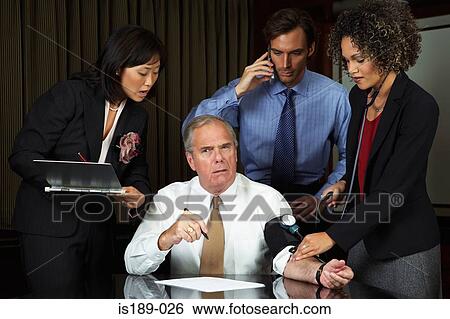Stock Photograph - Overworked businessman. Fotosearch