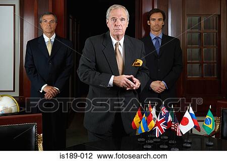 Portrait of three businessmen View Large Photo Image Stock Image - Portrait of three businessmen. Fotosearch