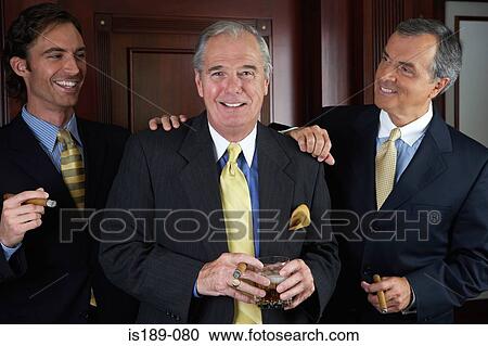 Stock Image - Portrait of three businessmen. Fotosearch
