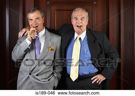 Portrait of two ceo's smoking cigars View Large Photo Image Stock Photograph - Portrait of two ceo's smoking cigars. Fotosearch