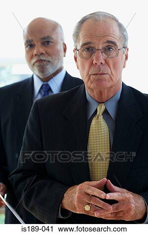 Stock Image - Portrait of two ceo's. Fotosearch