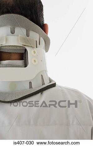 Man wearing a neck brace View Large Photo Image Stock Image - Man wearing a neck brace. Fotosearch