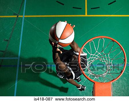 Basketball player scoring View Large Photo Image Stock Photo - Basketball player scoring. Fotosearch