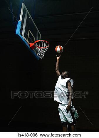 Stock Photograph - Basketball player. Fotosearch