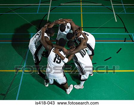Basketball players huddling View Large Photo Image Stock Image - Basketball players huddling. Fotosearch