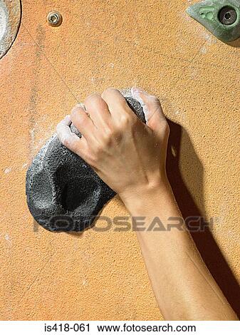 Stock Image - Hand of a rock climber. Fotosearch