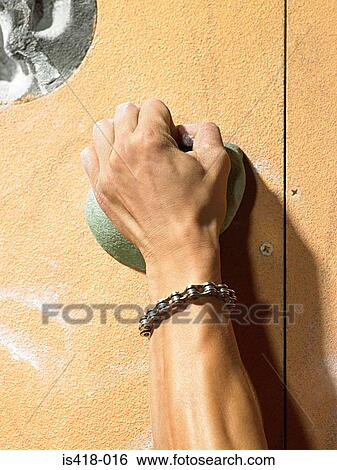 Stock Photograph - Hand of a rock climber. Fotosearch