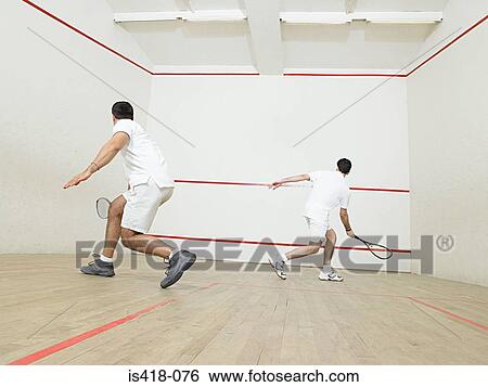 Men playing squash View Large Photo Image Stock Photograph - Men playing squash. Fotosearch