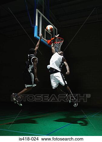 Rival basketball players View Large Photo Image Picture - Rival basketball players. Fotosearch