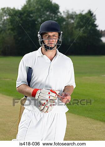 Stock Photograph - Young cricketer. Fotosearch