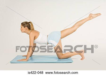 Stock Photo - Woman stretching leg. Fotosearch
