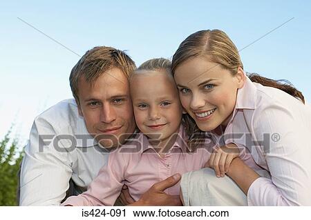 Family out in the garden View Large Photo Image Stock Image - Family out in the garden. Fotosearch
