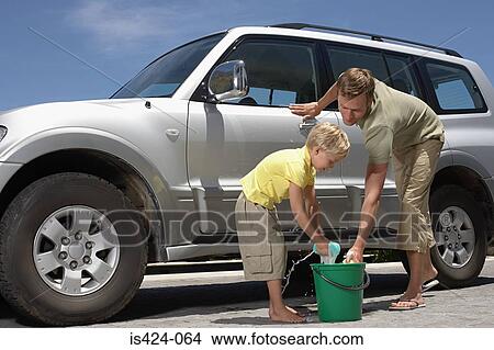 Father and son washing family car View Large Photo Image Picture - Father and son washing family car. Fotosearch