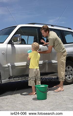 Father and son washing the car View Large Photo Image Stock Photograph - Father and son washing the car. Fotosearch