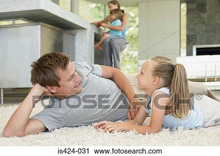 Portrait of a family at home View Large Photo Image Stock Image - Portrait of a family at home. Fotosearch