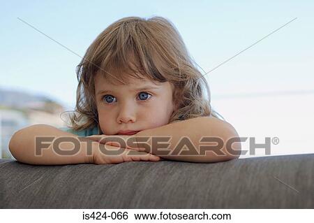 Portrait of a young girl View Large Photo Image Stock Photograph - Portrait of a young girl. Fotosearch