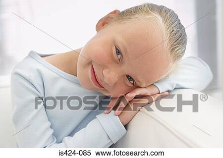 Portrait of a young girl View Large Photo Image Stock Photography - Portrait of a young girl. Fotosearch