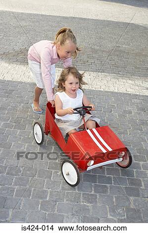 pushing a toy car