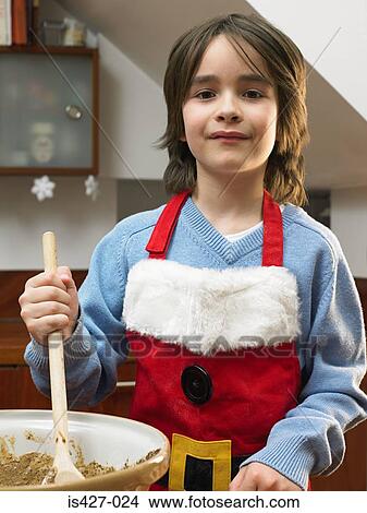 Picture - Boy with mixing bowl. Fotosearch