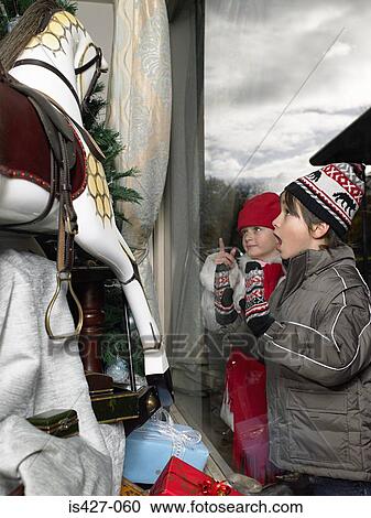 Brother and sister christmas shopping View Large Photo Image Stock Image - Brother and sister christmas shopping. Fotosearch