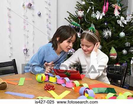 Children making christmas cards and decorations View Large Photo Image Stock Photography - Children making christmas cards and decorations. Fotosearch