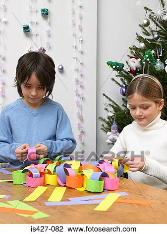 Children making paper chain View Large Photo Image Stock Image - Children making paper chain. Fotosearch