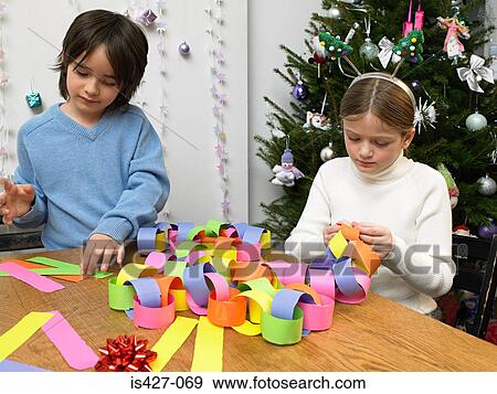 Children making paper chain View Large Photo Image Stock Photo - Children making paper chain. Fotosearch