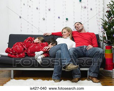 Family at christmas time View Large Photo Image Stock Image - Family at christmas time. Fotosearch