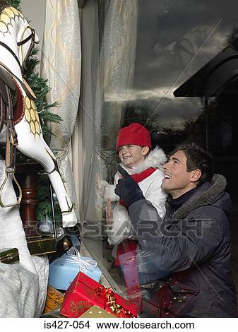 Father and daughter christmas shopping View Large Photo Image Picture - Father and daughter christmas shopping. Fotosearch