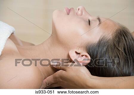 Girl being massaged View Large Photo Image Stock Image - Girl being massaged. Fotosearch