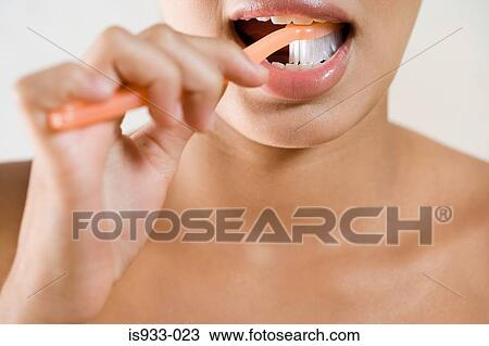 Girl brushing teeth View Large Photo Image Stock Image - Girl brushing teeth. Fotosearch