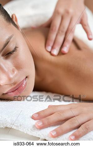 Girl having a massage View Large Photo Image Picture - Girl having a massage. Fotosearch