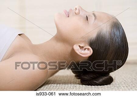 Girl lying down View Large Photo Image Stock Image - Girl lying down. Fotosearch