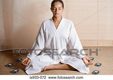 Stock Image - Girl meditating. Fotosearch