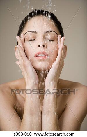 Woman under shower of water View Large Photo Image Stock Image - Woman under shower of water. Fotosearch
