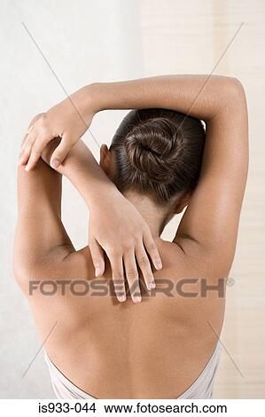 Young woman stretching View Large Photo Image Picture - Young woman stretching. Fotosearch