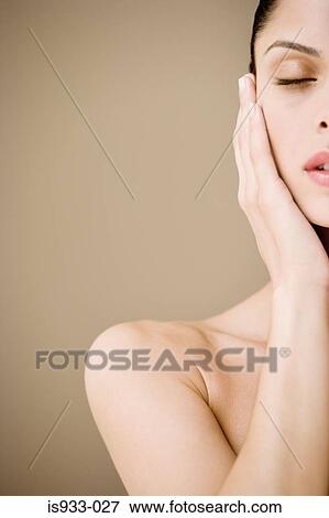 Young woman with eyes closed View Large Photo Image Stock Photo - Young woman with eyes closed. Fotosearch