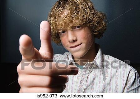 Stock Image - Portrait of a teenage boy. Fotosearch