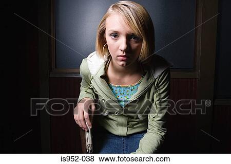 Stock Photo - Portrait of a teenage girl. Fotosearch