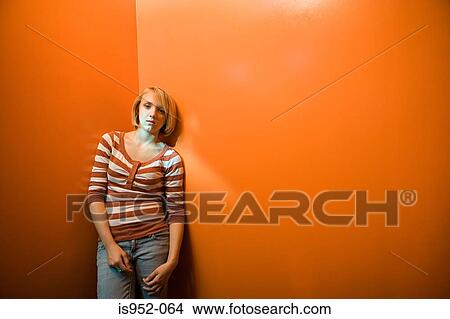 Teenage girl standing alone View Large Photo Image Picture - Teenage girl standing alone. Fotosearch