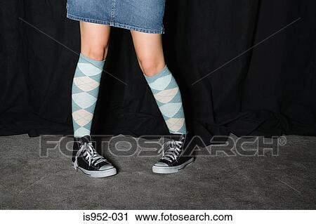 Stock Image - Teenage girls legs. Fotosearch