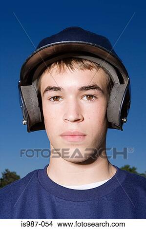 Picture - Portrait of a teenage boy wearing a helmet. Fotosearch