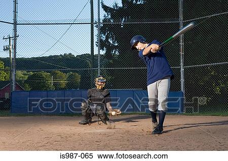 Teenage boy missing baseball View Large Photo Image Stock Photography - Teenage boy missing baseball. Fotosearch