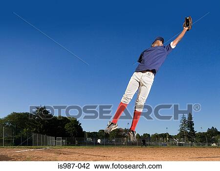 Teenage boy playing baseball View Large Photo Image Stock Image - Teenage boy playing baseball. Fotosearch