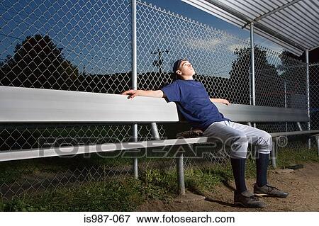 Teenage boy watching from the sidelines View Large Photo Image Stock Photo - Teenage boy watching from the sidelines. Fotosearch