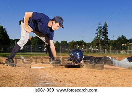 Two teenage boys playing baseball View Large Photo Image Stock Photo - Two teenage boys playing baseball. Fotosearch