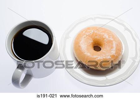 Coffee and a doughnut View Large Photo Image Stock Image - Coffee and a doughnut. Fotosearch