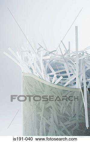 Shredded paper in the bin View Large Photo Image Stock Image - Shredded paper in the bin. Fotosearch